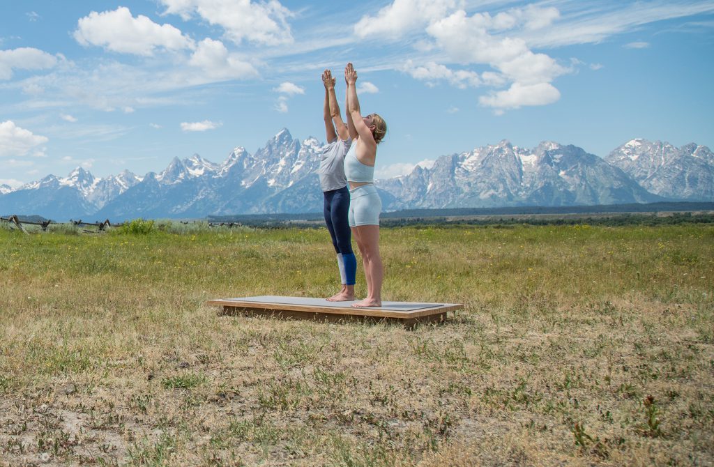 Demonstrating good posture in mountain pose