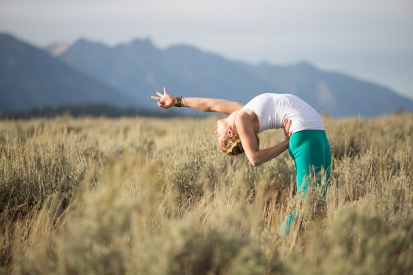 woman practices yoga in Jackson Hole, Wyoming -yogatoday